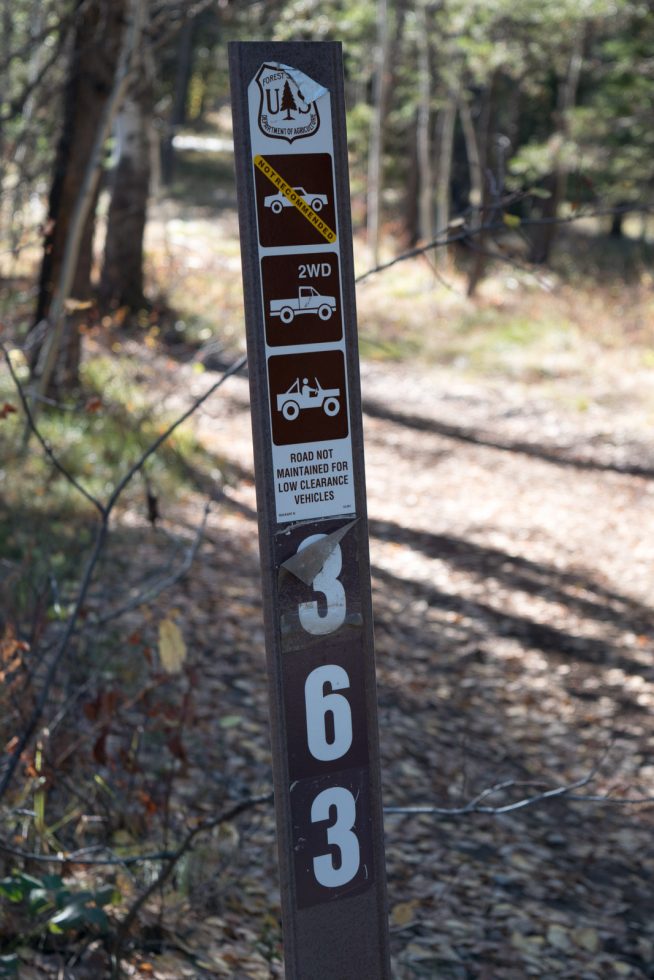 road sign with directions on it